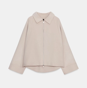 Women's minimalist soft wool jacket in apricot featuring a lapel collar and metal zipper