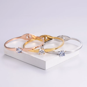 Classic titanium steel bangles in gold, silver, and rose gold with brilliant white crystals