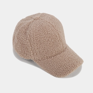 Detailed view of khaki lamb wool baseball cap texture with warm thickened fleece material