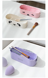 Close-up of silicone makeup brush cleaning mats with textured surfaces in multiple colors