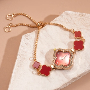 Detail of clover quartz watch with diamond bezel and adjustable rose gold chain