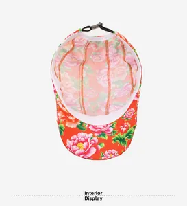 Detail view of ethnic style cap interior with floral print and adjustable strap
