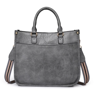 Sac à main vintage gris foncé avec bandoulière rayée et poignée supérieure