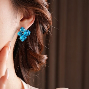 Chic blue crystal cube stud earrings in a geometric multi-layered 3D architectural design