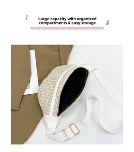 Top view of cream straw woven waist bag showing internal capacity and large opening