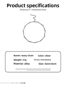 Detail view of silver wave chain necklace with lobster clasp and adjustable extension link