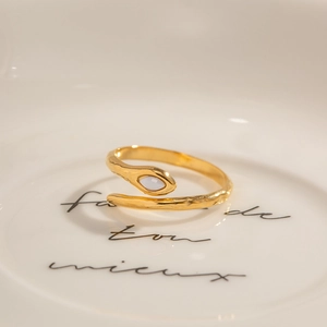 Snake shaped 18K gold plated ring with blue marquise stone and hammered texture