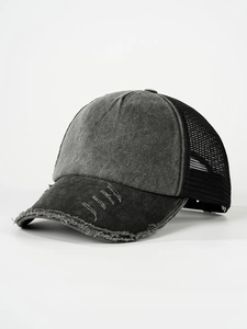 Close-up of distressed washed grey fabric and breathable black mesh on baseball cap