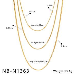 Detailed specs for gold layered necklace with triple chain lengths and weight info