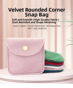 Close-up of assorted velvet jewelry pouches with metallic snap buttons in various colors