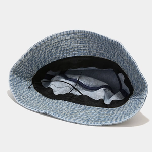 Adjustable washed denim bucket hat with internal sweatband and drawstring detail