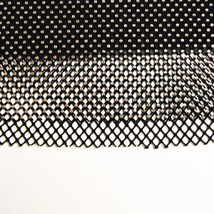 Detail of black mesh fabric with sparkling rhinestones and mesh fringe hemline finish
