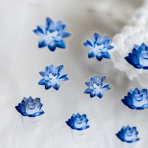 Blue floral nail art stickers with textured PET finish and 3D woven pattern effect