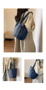 Detail view of denim patchwork tote bag showing shoulder carry and handheld styling options