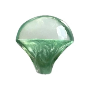 Modern oval resin drawer knob with green marble swirl pattern and clear finish