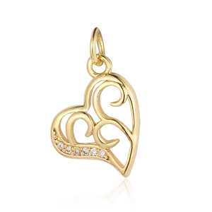 Detailed macro view of gold heart pendant featuring a 925 silver stamp and sparkling zircons