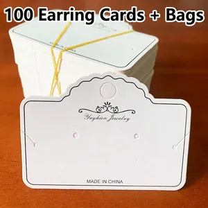 Set of 100 white jewelry display cards with bags for earrings and necklaces