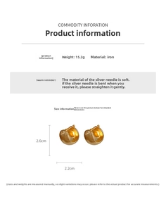 Detail view of gold chunky hoop earrings with brushed texture, weighing 15.2g and 2.6cm high