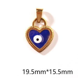 Macro detail of heart-shaped evil eye pendant in gold finish with blue enamel, 19.5mm