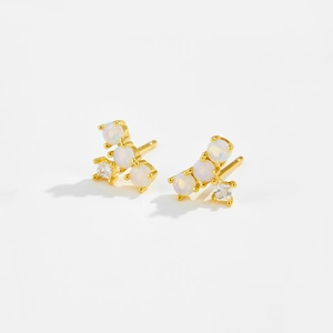 Elegant gold earrings with white opal beads and zircon accents on a clean white backdrop