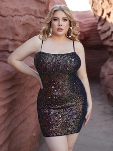 Tight-fitting black sequin mini dress for women featuring colorful sparkles in a desert setting