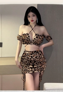 Detail of leopard print halter crop top and drawstring bodycon skirt outfit set
