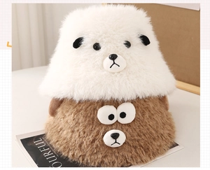Close-up of soft plush bucket hat with cute cartoon lamb ears and eyes detail