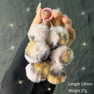 Detail of leopard plush keychain with pink spring clasp, length 130mm and weight 27g