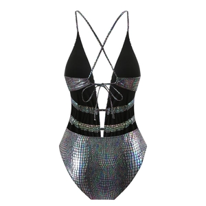 Detail of holographic crocodile pattern and black drawstring on the one-piece swimsuit