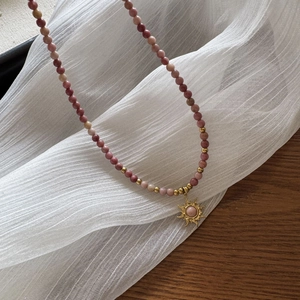 Handmade stainless steel sun pendant necklace with pink rhodochrosite beaded chain
