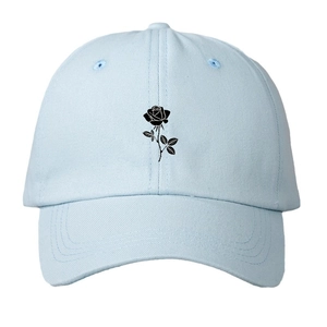 Light blue baseball cap with black rose print and curved brim for sun protection