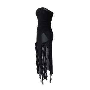 Detail of black strapless dress featuring asymmetric mesh ruffle hem and ruched fabric texture