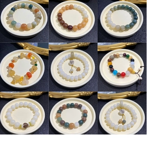 Collage of natural weathered bodhi beads and gemstones in various styles and colors