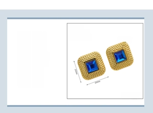 Detail of square 18k gold plated stainless steel earring featuring a blue zircon stone