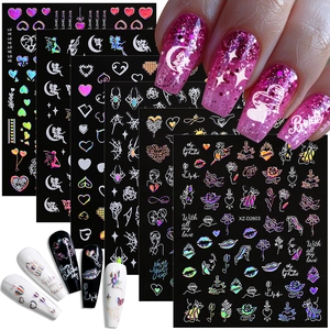 Detail showing red hearts, roses, and holographic designs on Valentine nail stickers