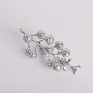 Close-up of shiny silver glitter berry stems for DIY Christmas wreath decorations