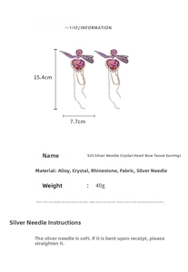 Detail view of purple crystal heart bow tassel earrings with 925 silver needles