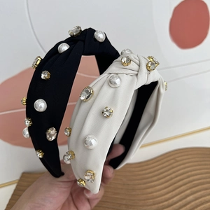 Knotted fabric headbands in black and beige with pearls and sparkling rhinestones