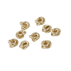 Set de nueve espaciadores de tres anillos retorcidos bañados en oro 14k para joyería