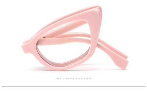 Detailed side view of pink cat-eye sunglasses with polished frames and sleek temples