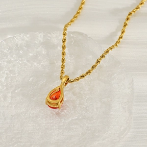 18K gold-plated twisted rope chain necklace with orange-red teardrop crystal pendant