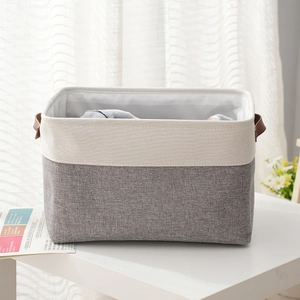 Foldable cotton linen EVA storage basket with brown leather handles in gray and white