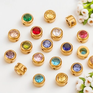 Macro detail of colorful crystal inlaid golden spacer beads for DIY jewelry making