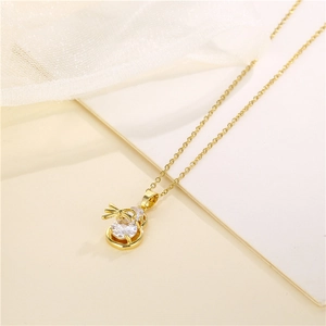 Elegant gold stainless steel necklace featuring a bow-knot gourd pendant with clear zircon