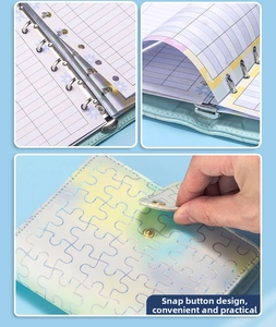 Detail of A7 laser puzzle texture cover and silver 6-hole metal binder with button snap
