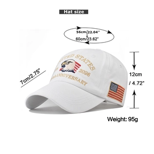 Detail of 3D eagle embroidery and US flag patch on white cotton anniversary baseball cap
