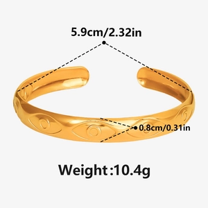 Detailed size specifications of the 18K gold evil eye cuff bracelet with dimensions
