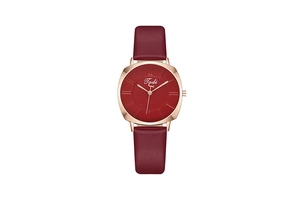 Macro shot of stylish square red leather strap watch with rose gold case on white backdrop