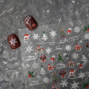 3D embossed Christmas nail stickers with Santa, reindeer, and snowflakes patterns