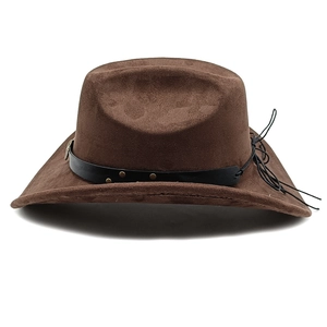 Close-up of brown suede cowboy hat with black leather belt and metal studs detail